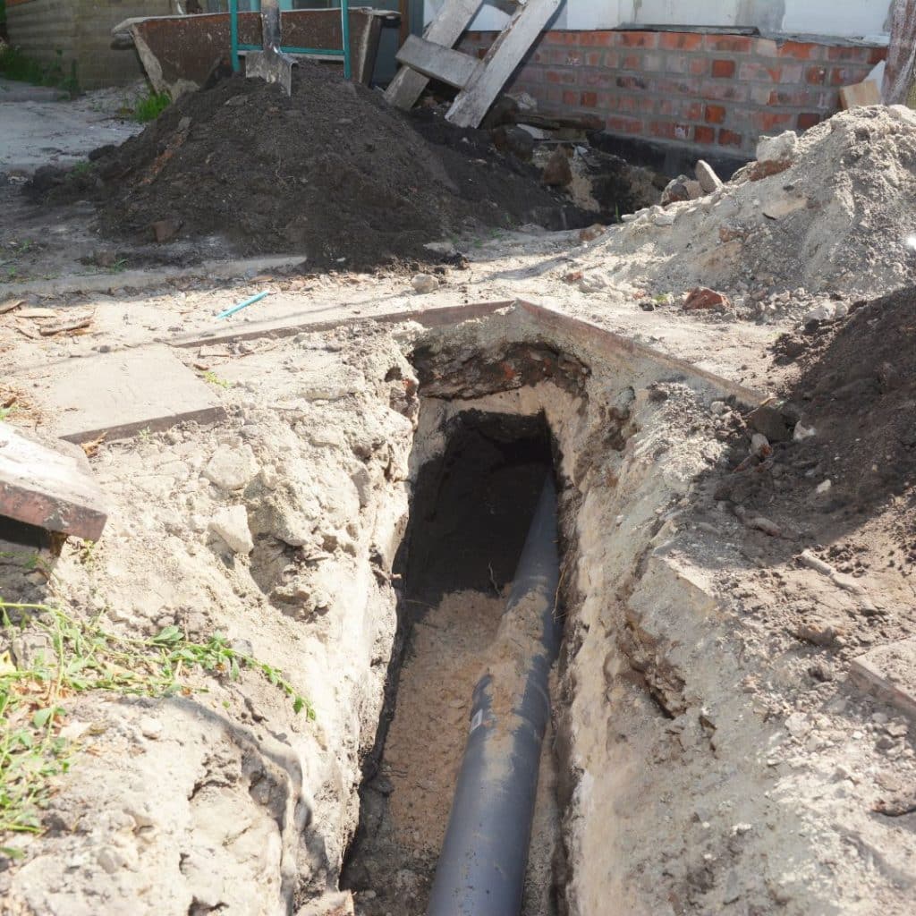 Dug up sewer main that is part of someone's home